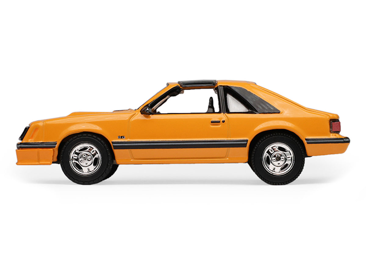 1982 Ford Foxbody Mustang Medium Vanilla Yellow with Black Top 'The Mustang Stampede' Series 2 1/64 Diecast Model Car by Greenlight