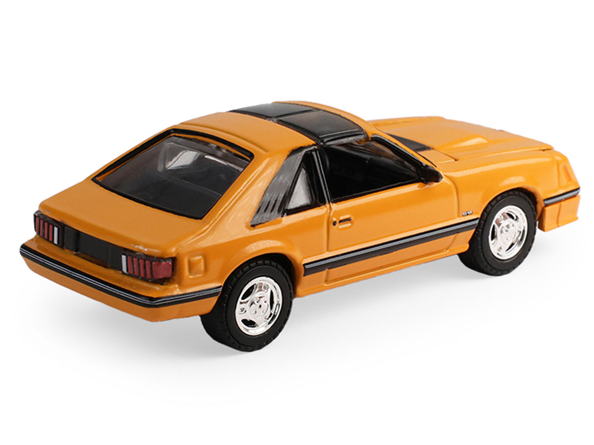 1982 Ford Foxbody Mustang Medium Vanilla Yellow with Black Top 'The Mustang Stampede' Series 2 1/64 Diecast Model Car by Greenlight