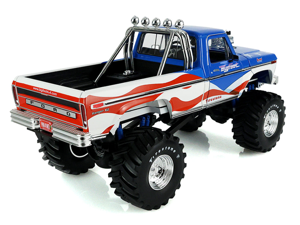 1979 Ford F-250 Monster Truck 'Bigfoot USA 250 Tribute' Blue with USA Flag Graphics and Bob Chandler Standing Figure 'Kings of Crunch' Series 1/18 Diecast Model Car by Greenlight