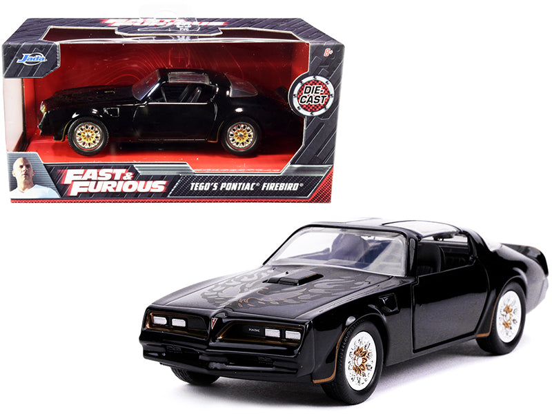 Tego's Pontiac Firebird Black with Gold Stripes and Hood Bird 'Fast & Furious' Series 1/32 Diecast Model Car by Jada