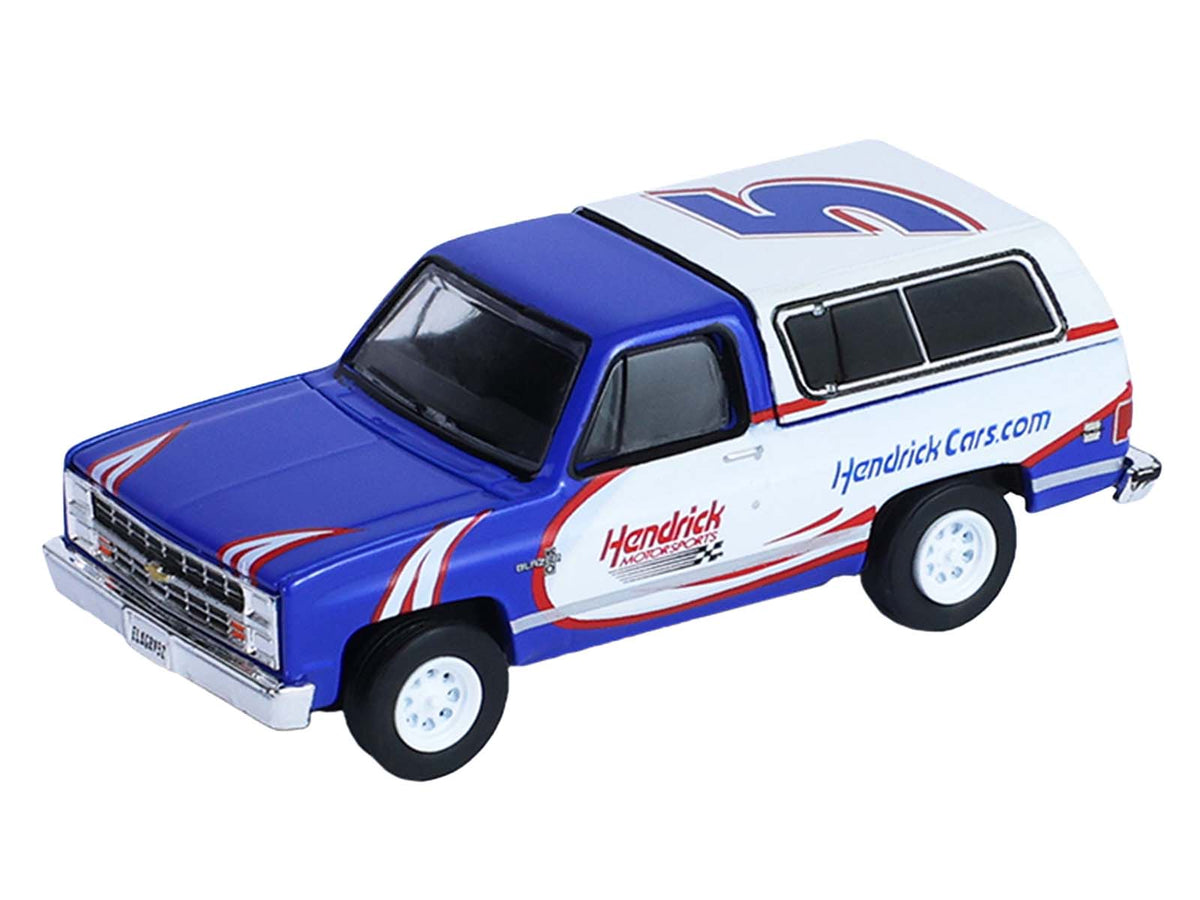 1986 Chevrolet K5 Blazer Blue and White and 1969 Chevrolet Camaro #5 Blue and White 'Kyle Larson - Hendrick Motorsports' with Tandem Car Trailer 'Racing Hitch & Tow' Series 6 1/64 Diecast Model Cars by Greenlight
