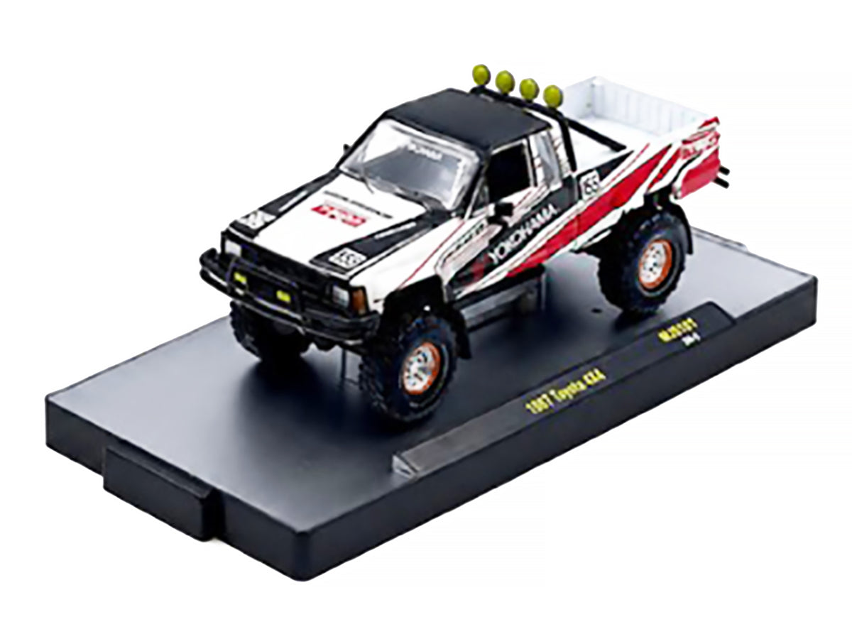 1985 Toyota SR5 4×4 Pickup Truck #85 'Yokohama' White with Black Top and Red and Black Graphics Limited Edition to 8250 pieces Worldwide 1/64 Diecast Model Car by M2 Machines