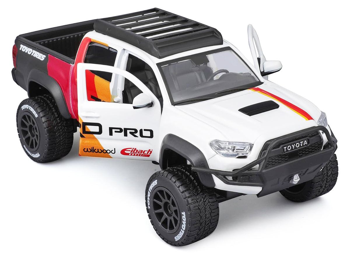 2023 Toyota Tacoma TRD PRO Off Road Pickup Truck White with Graphics and Roof Rack 'Maisto Design' Series 1/27 Diecast Model Car Maisto