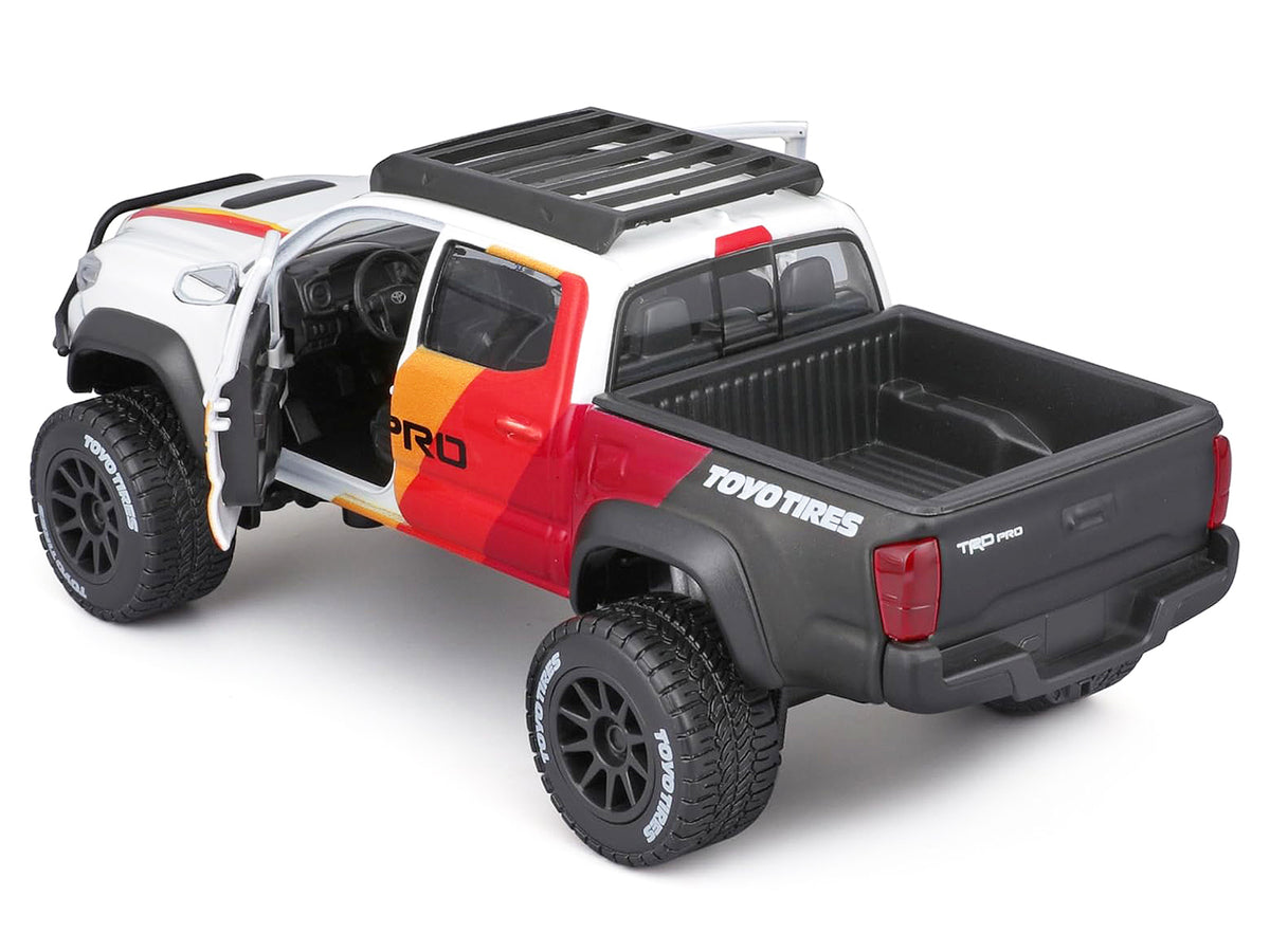2023 Toyota Tacoma TRD PRO Off Road Pickup Truck White with Graphics and Roof Rack 'Maisto Design' Series 1/27 Diecast Model Car Maisto