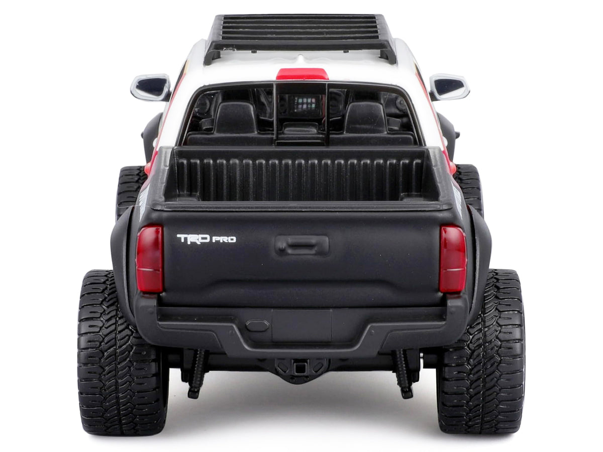 2023 Toyota Tacoma TRD PRO Off Road Pickup Truck White with Graphics and Roof Rack 'Maisto Design' Series 1/27 Diecast Model Car Maisto