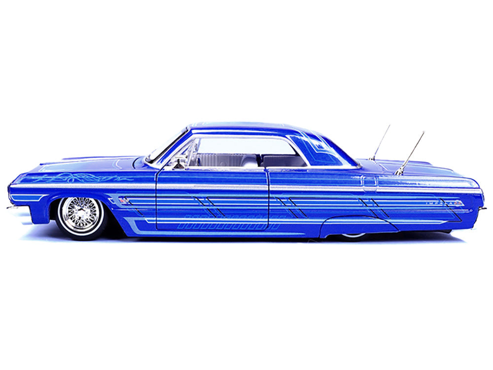 1964 Chevrolet Impala SS Lowrider Candy Blue with Graphics and White Interior 'Lowriders' 'Maisto Design' Series 1/26 Diecast Model Car by Maisto