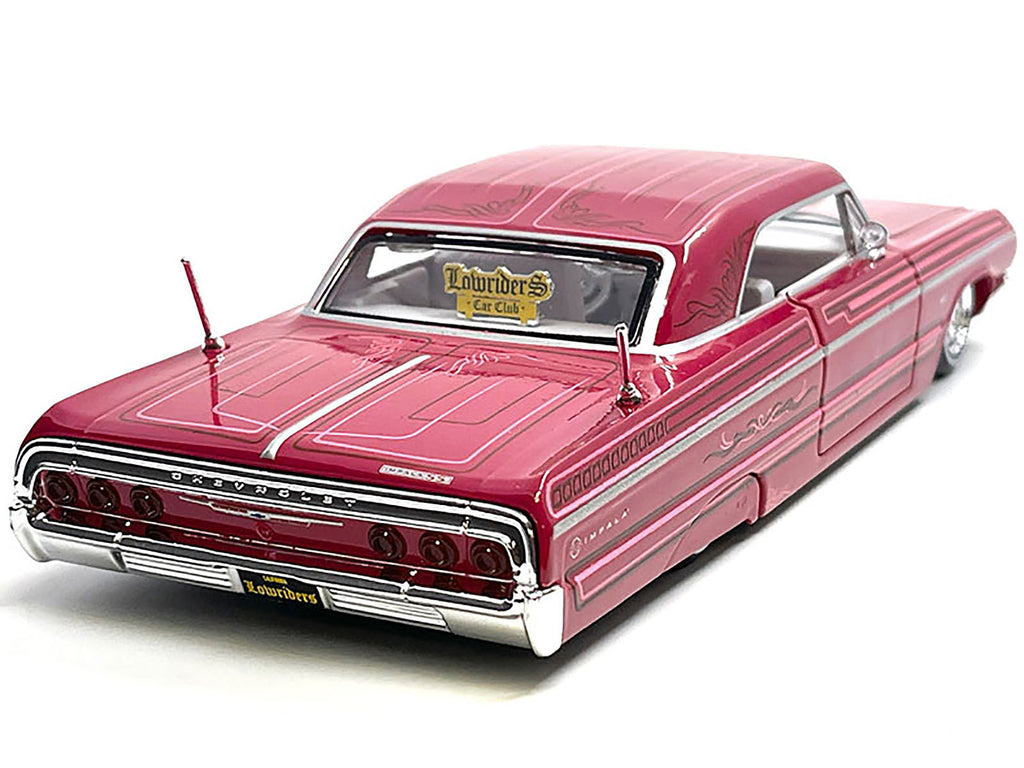 1964 Chevrolet Impala SS Lowrider Pink with Graphics and White Interior 'Lowriders' 'Maisto Design' Series 1/26 Diecast Model Car by Maisto