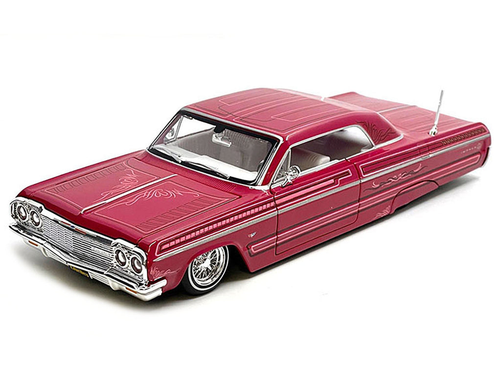 1964 Chevrolet Impala SS Lowrider Pink with Graphics and White Interior 'Lowriders' 'Maisto Design' Series 1/26 Diecast Model Car by Maisto