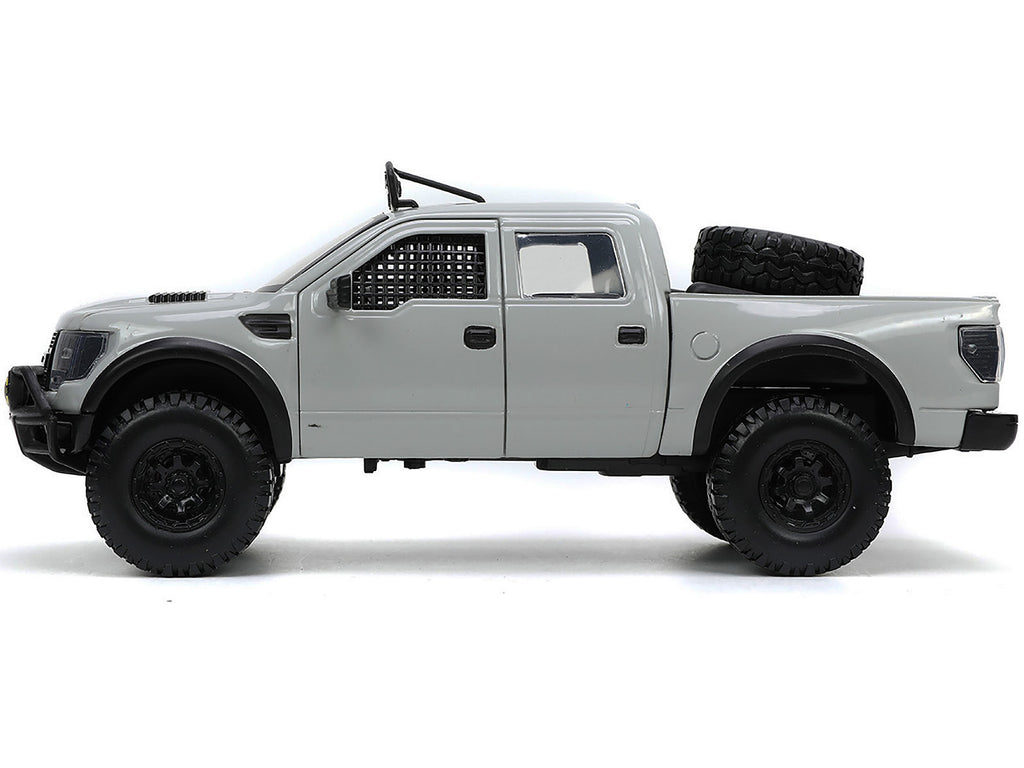 2011 Ford F-150 SVT Raptor Pickup Truck Light Gray with Extra Wheels 'Just Trucks' Series 1/24 Diecast Model Car by Jada
