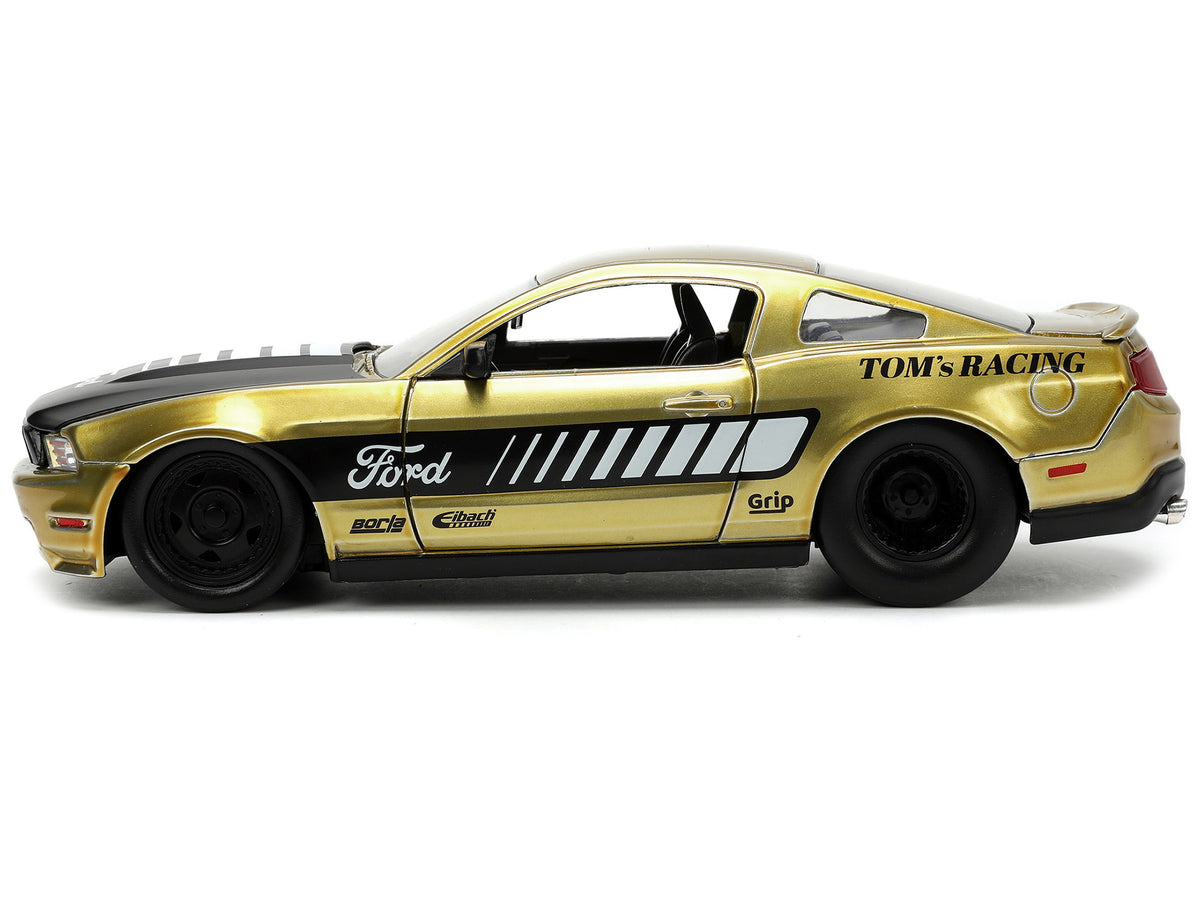 2010 Ford Mustang GT Gold Metallic with Black Graphics and Hood 'Tom's Racing' 'Bigtime Muscle' Series 1/24 Diecast Model Car by Jada
