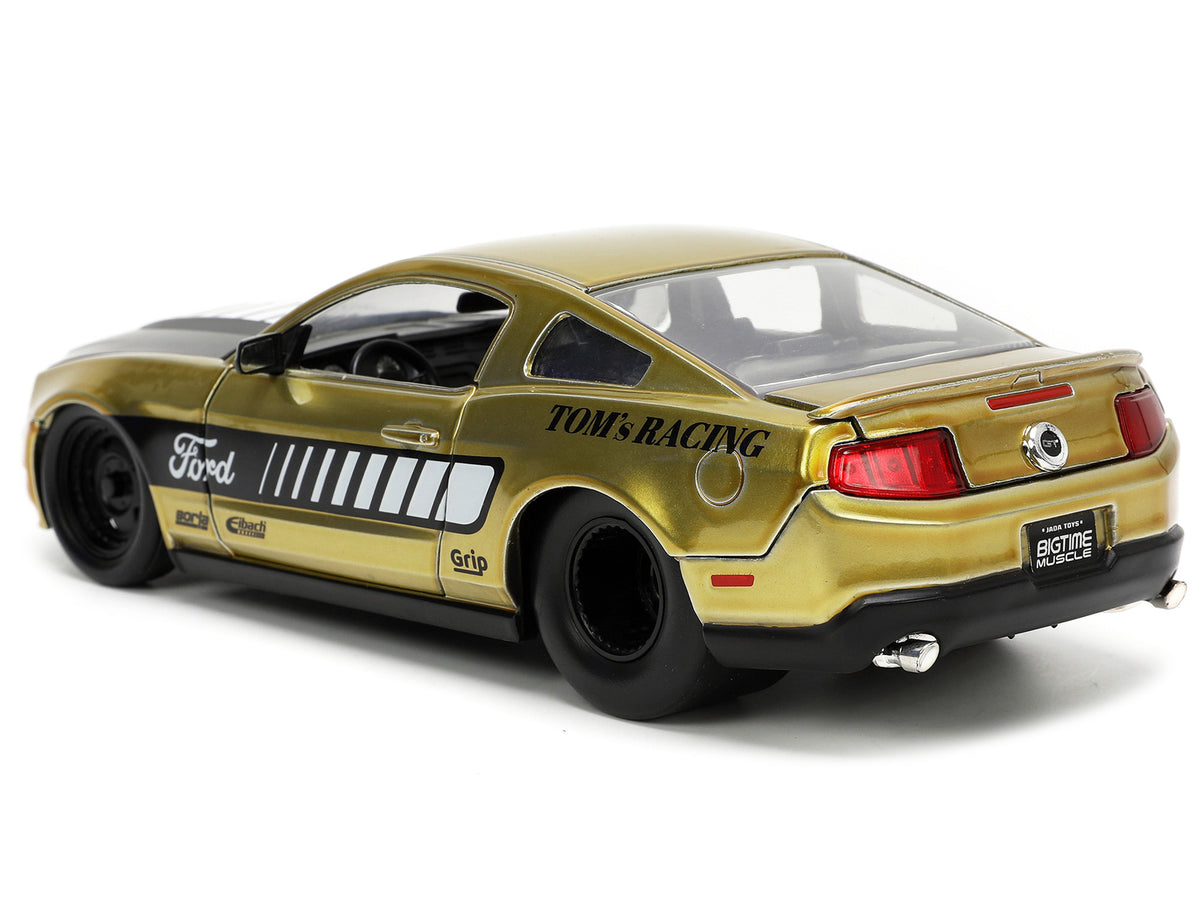 2010 Ford Mustang GT Gold Metallic with Black Graphics and Hood 'Tom's Racing' 'Bigtime Muscle' Series 1/24 Diecast Model Car by Jada