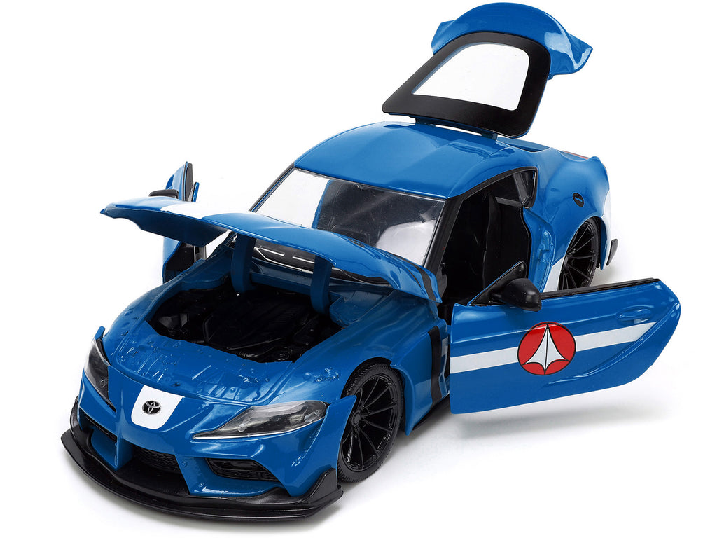 2020 Toyota Supra Blue with Graphics and Max Sterling Diecast Figurine 'Robotech' 'Hollywood Rides' Series 1/24 Diecast Model Car by Jada