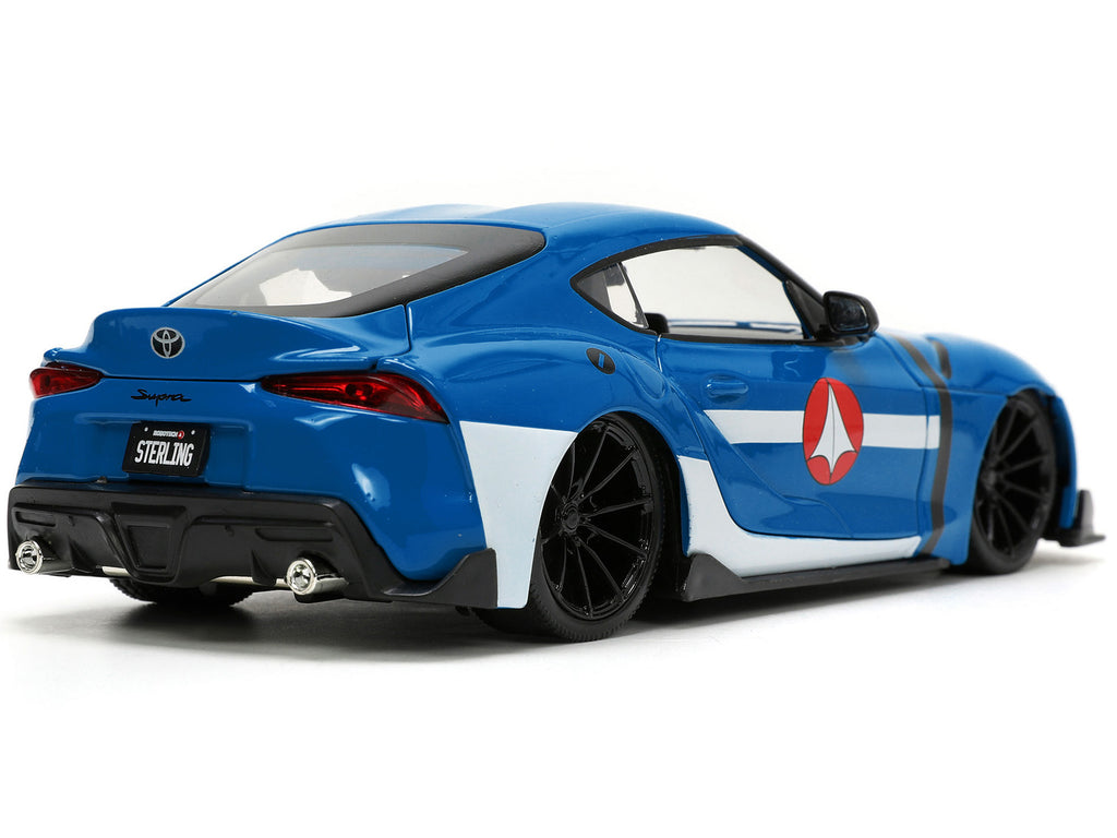 2020 Toyota Supra Blue with Graphics and Max Sterling Diecast Figurine 'Robotech' 'Hollywood Rides' Series 1/24 Diecast Model Car by Jada