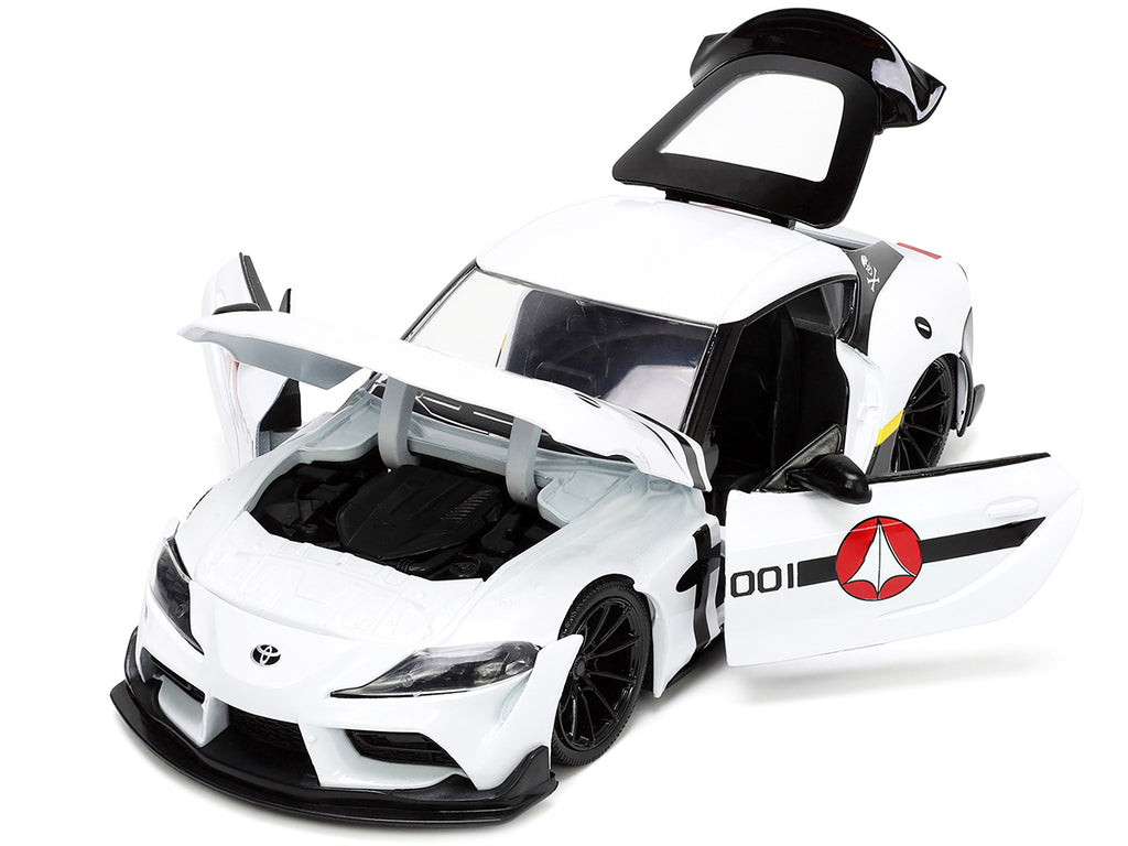 2020 Toyota Supra White and Roy Focker Diecast Figurine 'Robotech' 'Hollywood Rides' Series 1/24 Diecast Model Car by Jada