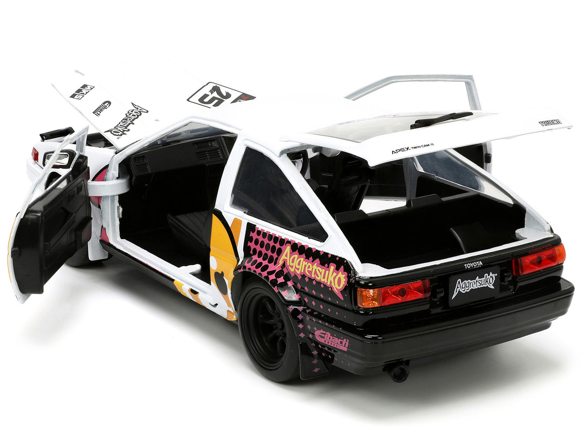 1986 Toyota Trueno (AE86) RHD (Right Hand Drive) #25 White with Graphics and Aggretsuko Diecast Figure 'Aggretsuko' 'Anime Hollywood Rides' Series 1/24 Diecast Model Car by Jada