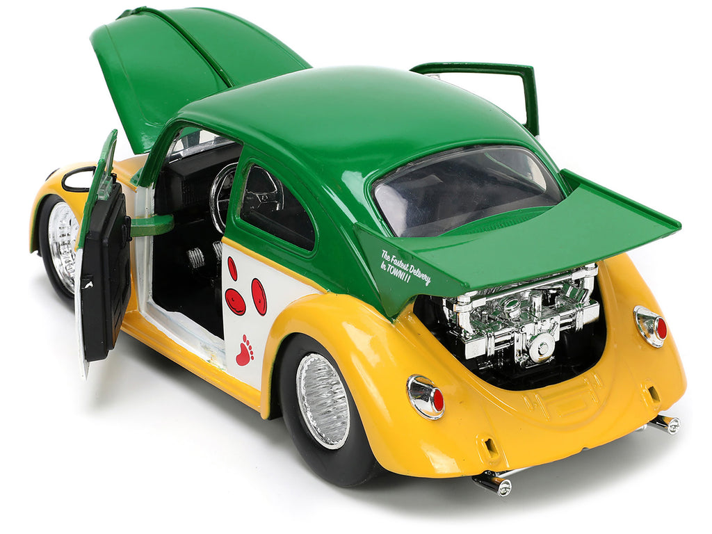 1959 Volkswagen Drag Beetle Green and Yellow and Michelangelo Diecast Figure 'Teenage Mutant Ninja Turtles' 'Hollywood Rides' Series 1/24 Diecast Model Car by Jada