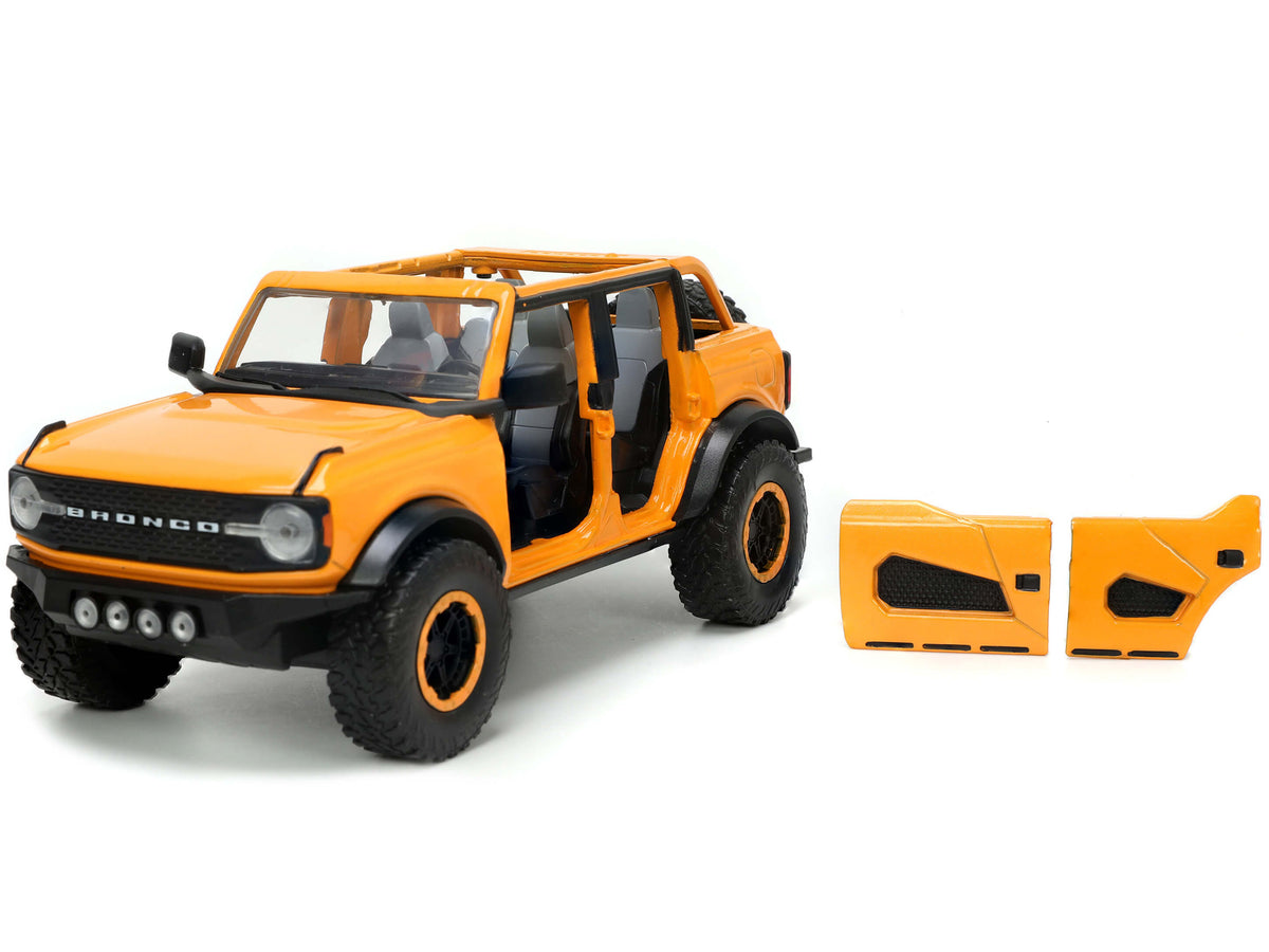 2021 Ford Bronco Orange Metallic with Extra Wheels 'Just Trucks' Series 1/24 Diecast Model Car by Jada