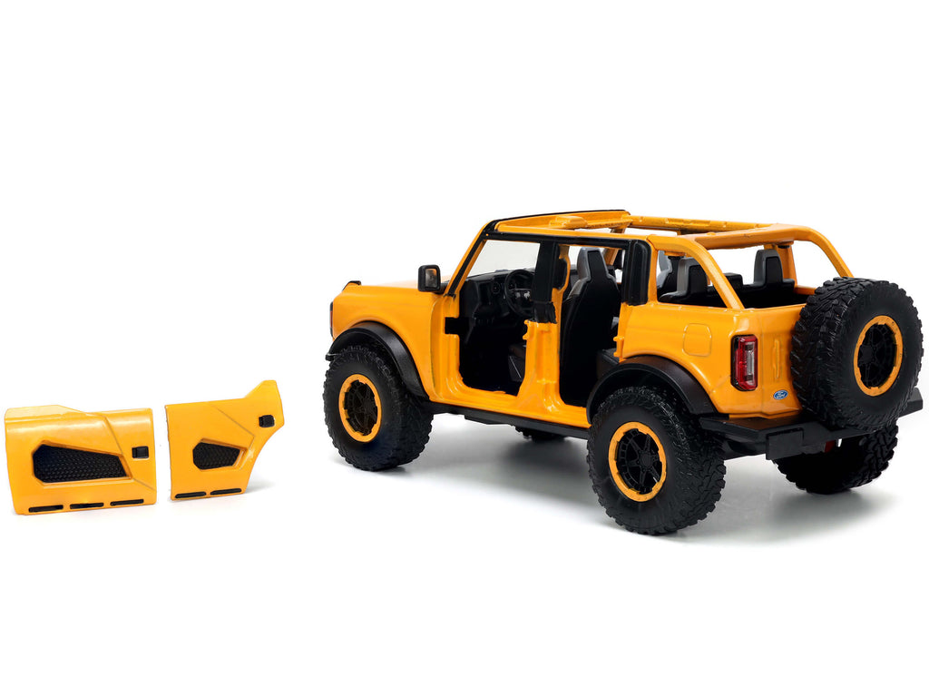 2021 Ford Bronco Orange Metallic with Extra Wheels 'Just Trucks' Series 1/24 Diecast Model Car by Jada