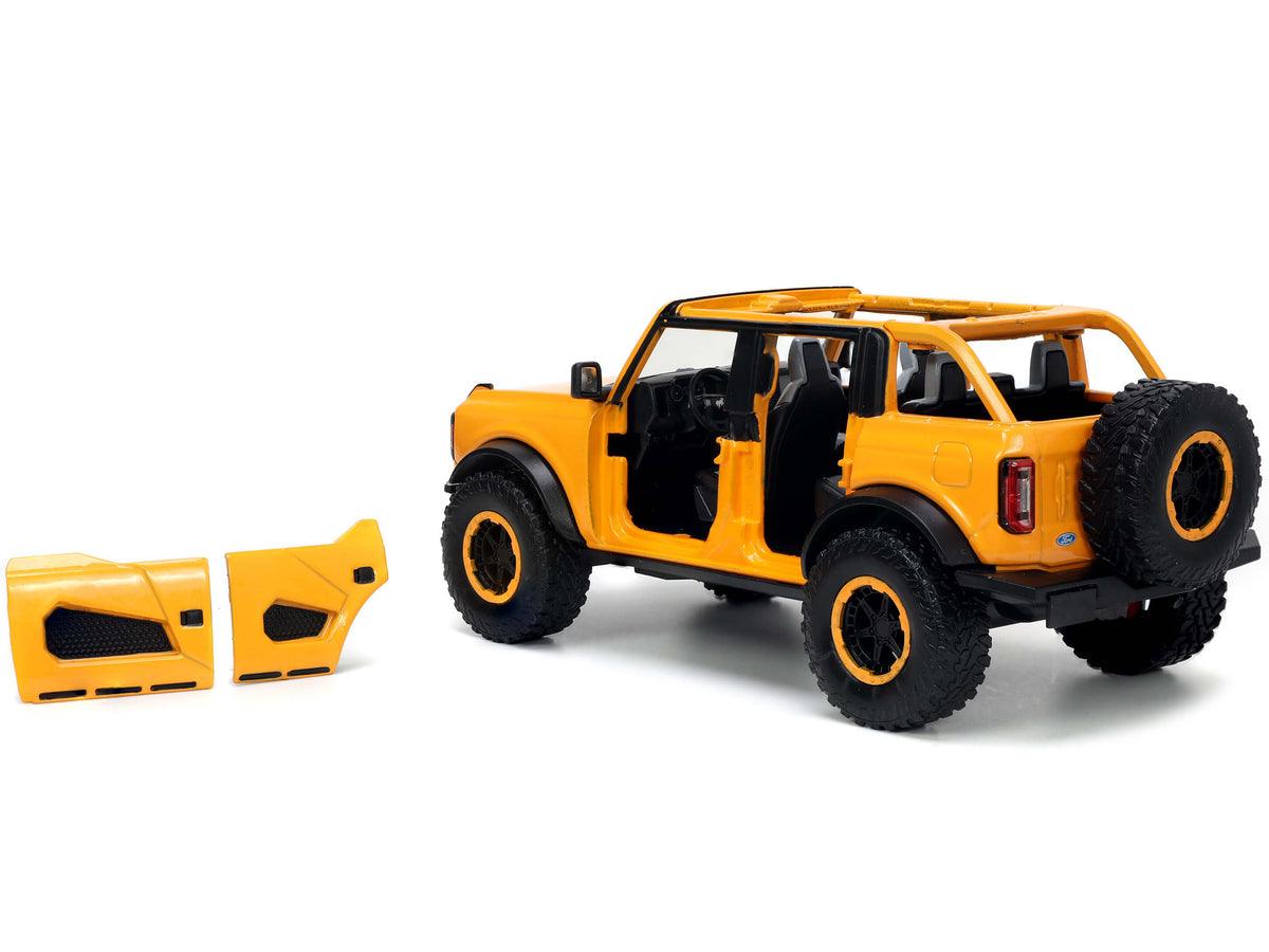 2021 Ford Bronco Orange Metallic with Extra Wheels 'Just Trucks' Series 1/24 Diecast Model Car by Jada
