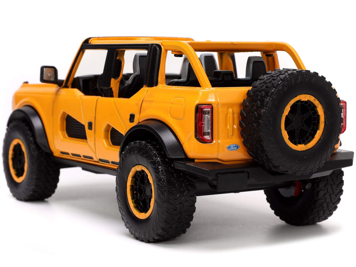 2021 Ford Bronco Orange Metallic with Extra Wheels 'Just Trucks' Series 1/24 Diecast Model Car by Jada