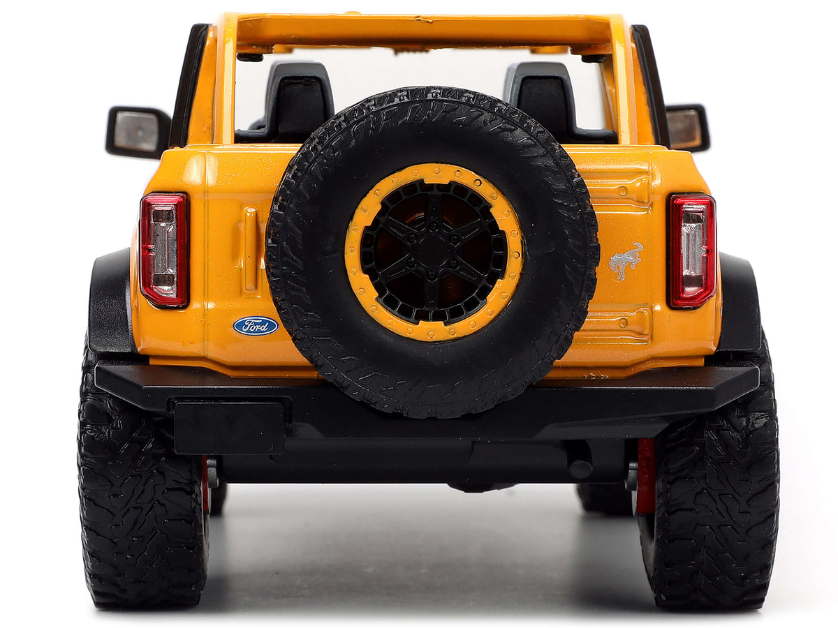 2021 Ford Bronco Orange Metallic with Extra Wheels 'Just Trucks' Series 1/24 Diecast Model Car by Jada