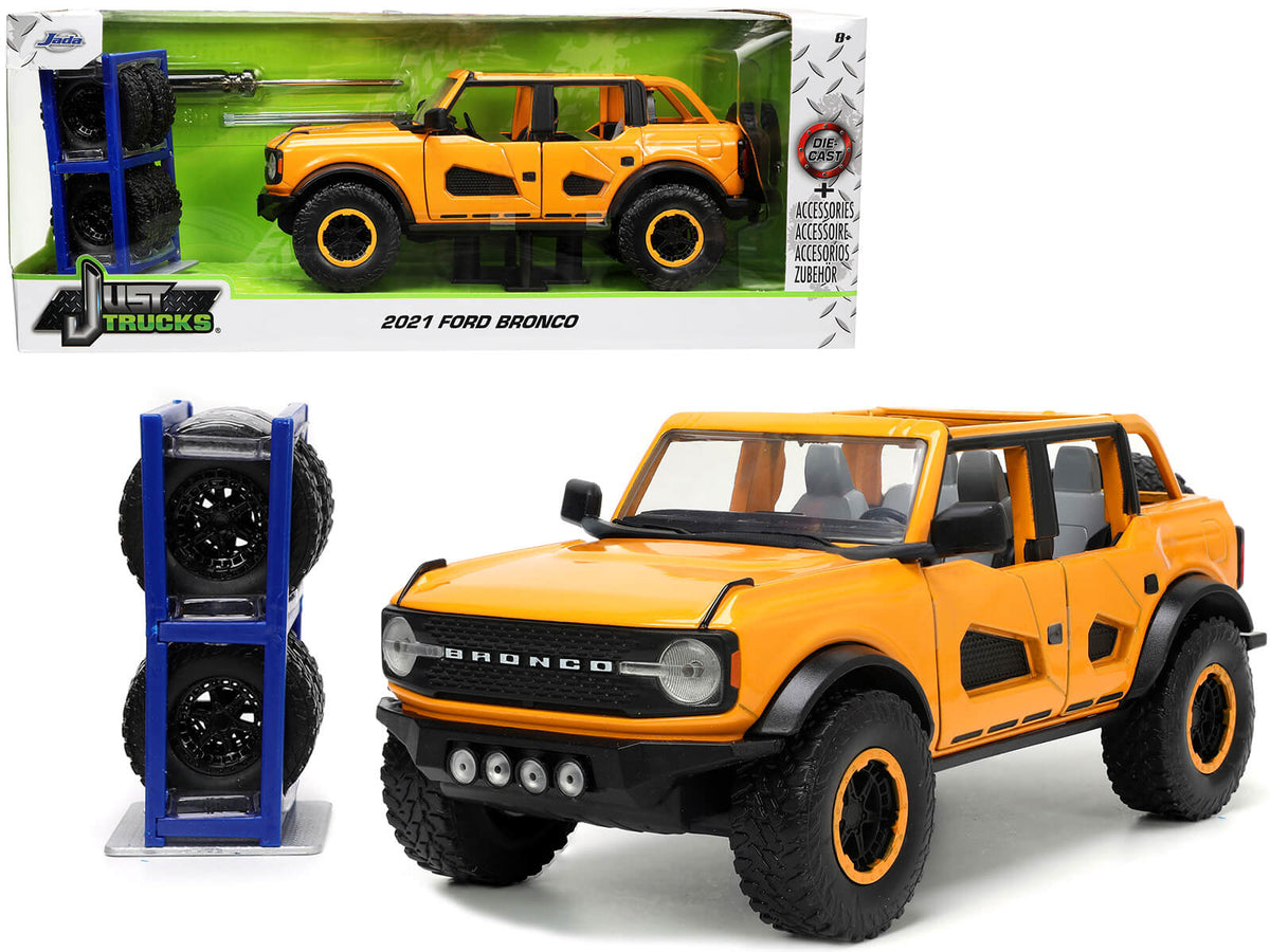 2021 Ford Bronco Orange Metallic with Extra Wheels 'Just Trucks' Series 1/24 Diecast Model Car by Jada