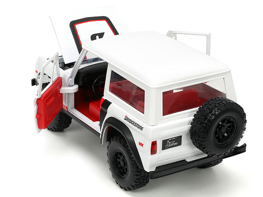 1973 Ford Bronco #008 White with Red and Black Stripes and Red Interior with Extra Wheels 'Just Trucks' Series 1/24 Diecast Model Car by Jada