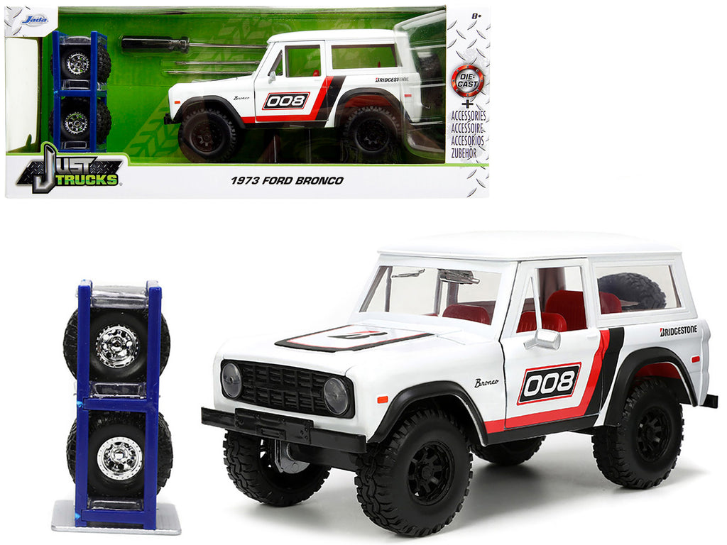 1973 Ford Bronco #008 White with Red and Black Stripes and Red Interior with Extra Wheels 'Just Trucks' Series 1/24 Diecast Model Car by Jada