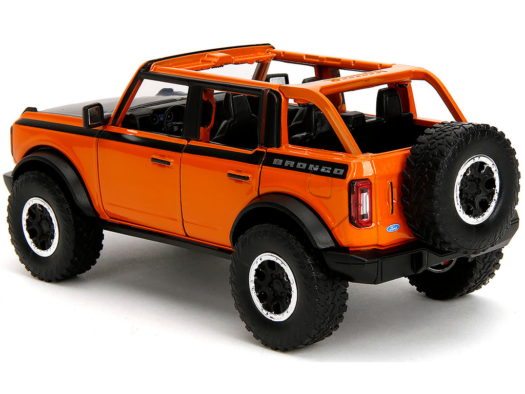 2021 Ford Bronco Open-Top Orange with Black Stripes and Hood with Extra Wheels 'Just Trucks' Series 1/24 Diecast Model Car by Jada