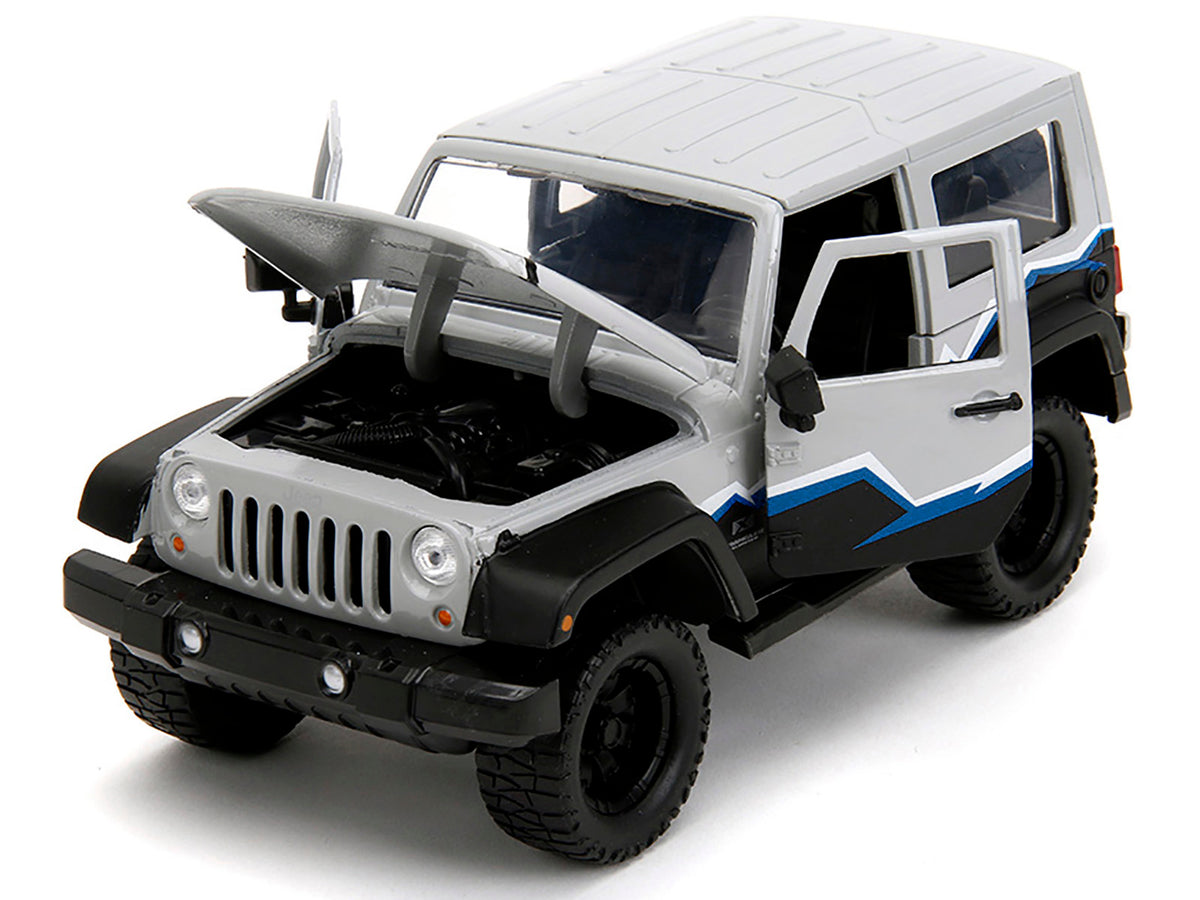 2007 Jeep Wrangler Gray and Black with Blue and White Stripes with Extra Wheels 'Just Trucks' Series 1/24 Diecast Model Car by Jada