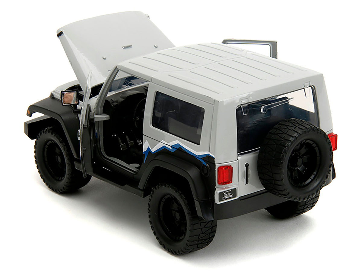2007 Jeep Wrangler Gray and Black with Blue and White Stripes with Extra Wheels 'Just Trucks' Series 1/24 Diecast Model Car by Jada