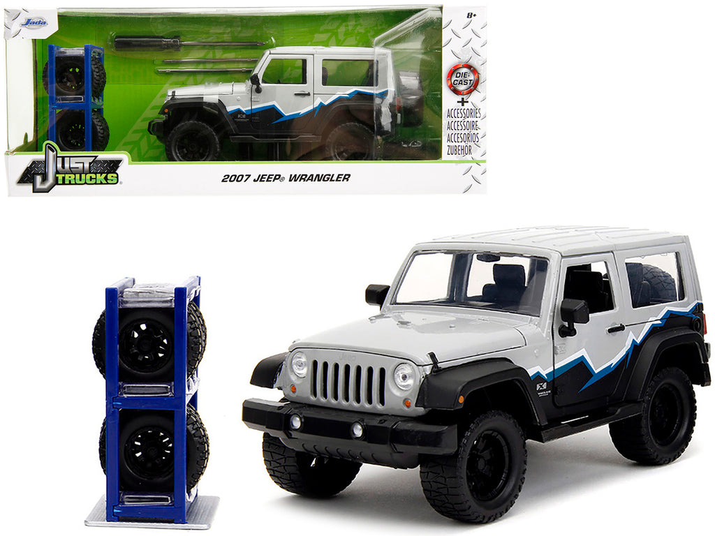 2007 Jeep Wrangler Gray and Black with Blue and White Stripes with Extra Wheels 'Just Trucks' Series 1/24 Diecast Model Car by Jada