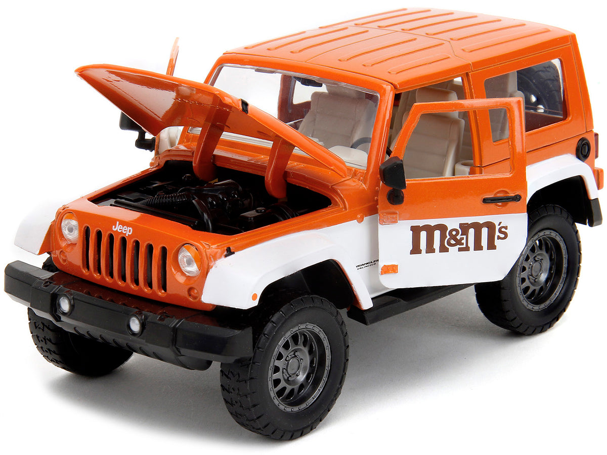 2007 Jeep Wrangler Orange Metallic and White and Orange M&M Diecast Figure 'M&M's' 'Hollywood Rides' Series 1/24 Diecast Model Car by Jada