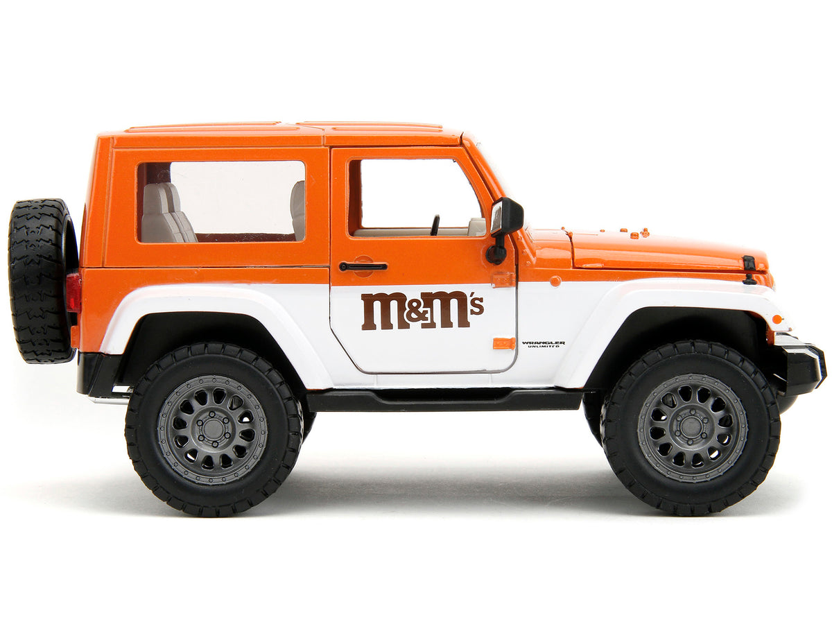 2007 Jeep Wrangler Orange Metallic and White and Orange M&M Diecast Figure 'M&M's' 'Hollywood Rides' Series 1/24 Diecast Model Car by Jada