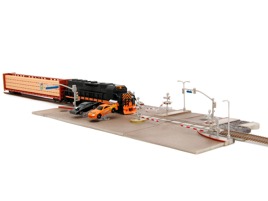 'Fast & Furious' Final Race Diorama with Toyota Supra Orange and Dodge Charger Black 'Nano Scene' Series model by Jada