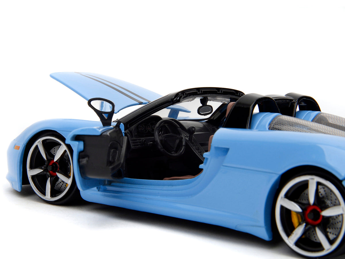 Porsche Carrera GT Convertible Blue with Black Stripes 'Pink Slips' Series 1/24 Diecast Model Car by Jada