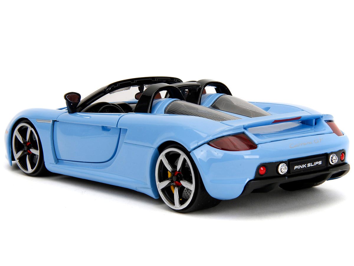 Porsche Carrera GT Convertible Blue with Black Stripes 'Pink Slips' Series 1/24 Diecast Model Car by Jada
