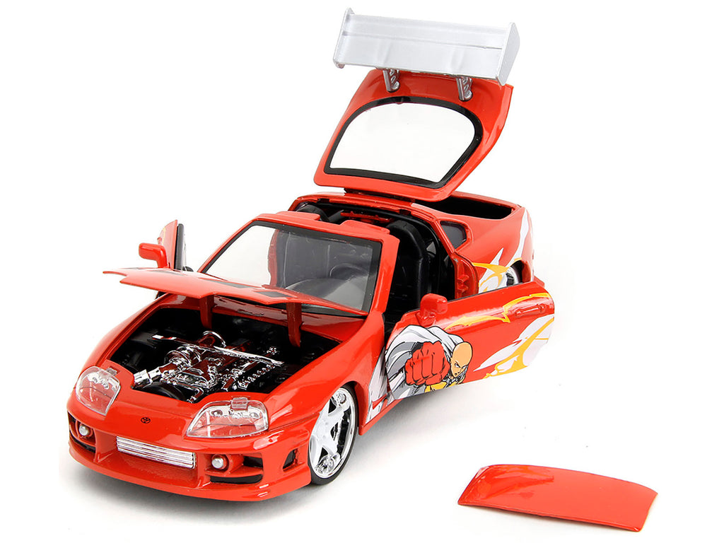 1995 Toyota Supra Red with Graphics and Saitama Diecast Figure 'One Punch Man' (2015-2019) TV Series 1/24 Diecast Model by Jada