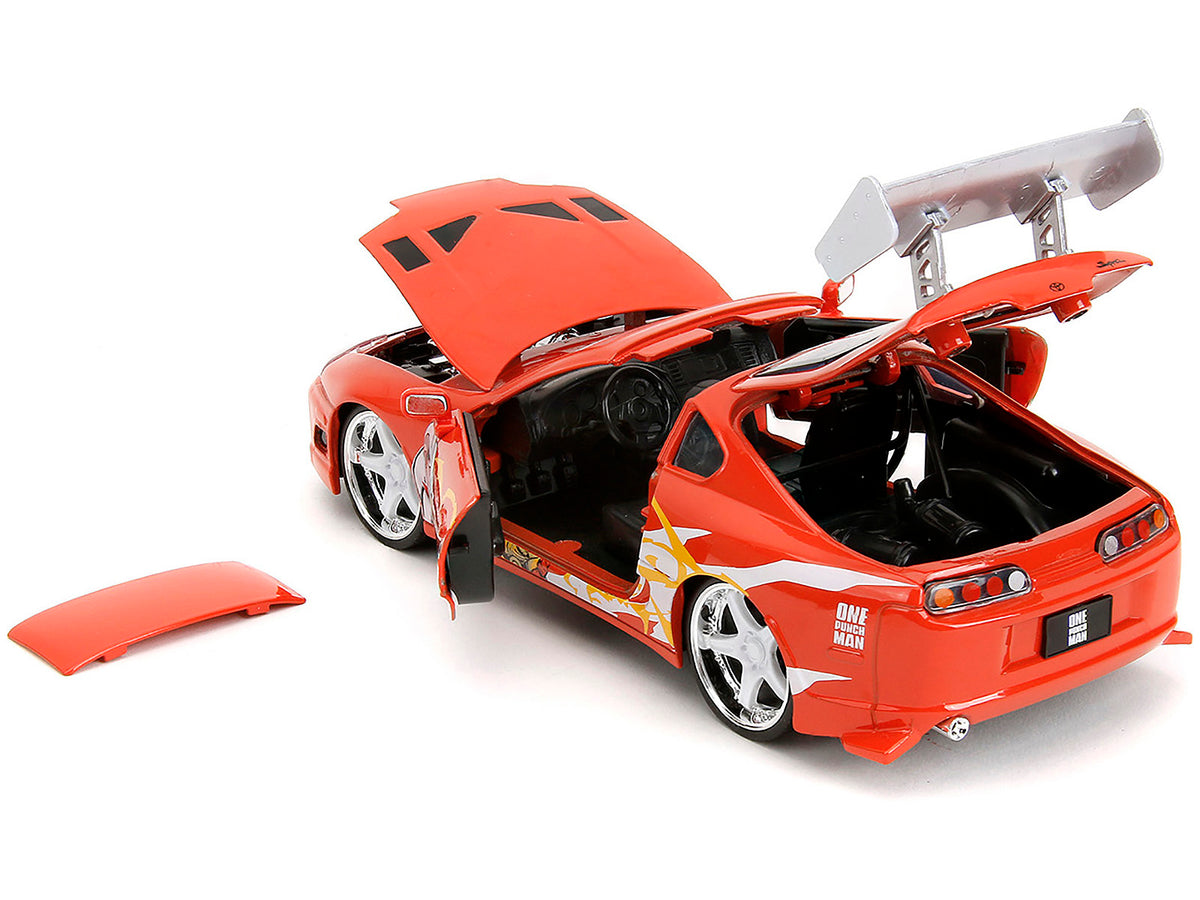 1995 Toyota Supra Red with Graphics and Saitama Diecast Figure 'One Punch Man' (2015-2019) TV Series 1/24 Diecast Model by Jada