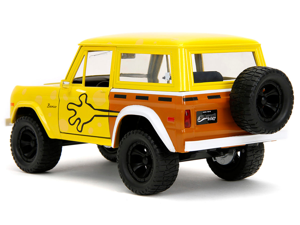 1973 Ford Bronco Yellow with Graphics and SpongeBob SquarePants Diecast Figure 'SpongeBob SquarePants' (1999–Current) TV Series 'Hollywood Rides' Series 1/24 Diecast Model Car by Jada