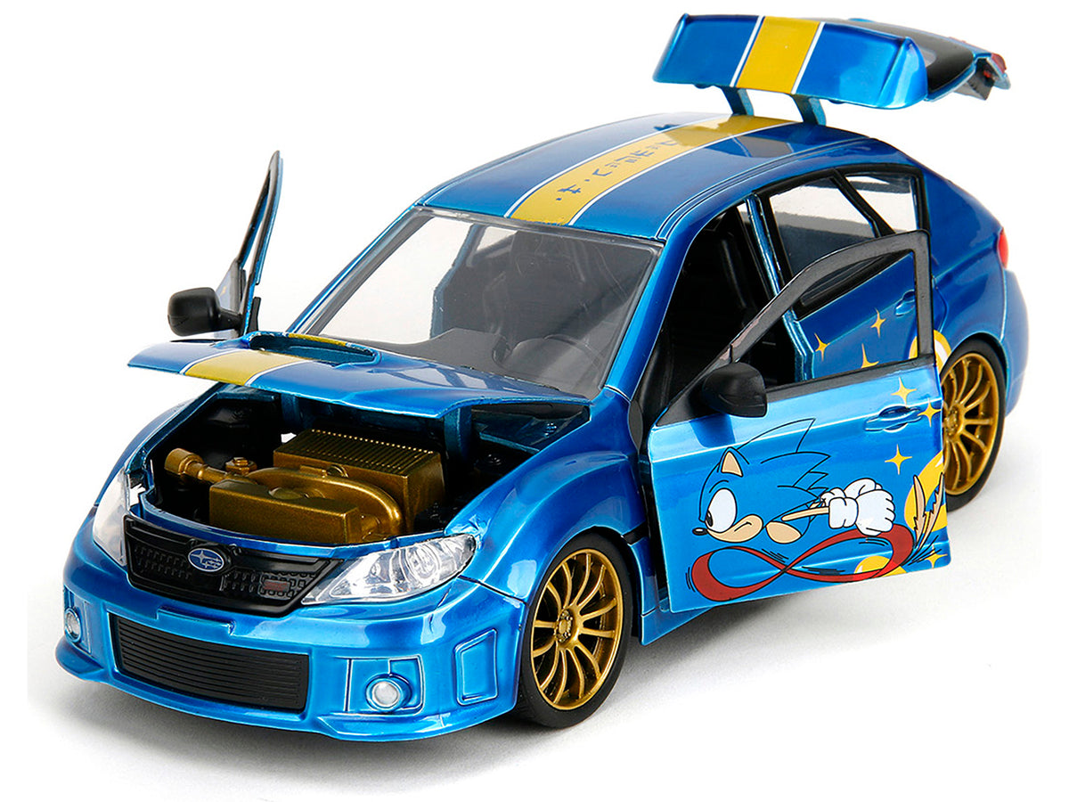2012 Subaru Impreza WRX STI Blue Metallic with Graphics and Sonic The Hedgehog Diecast Figure 'Sonic The Hedgehog' 'Hollywood Rides' Series 1/24 Diecast Model Car by Jada