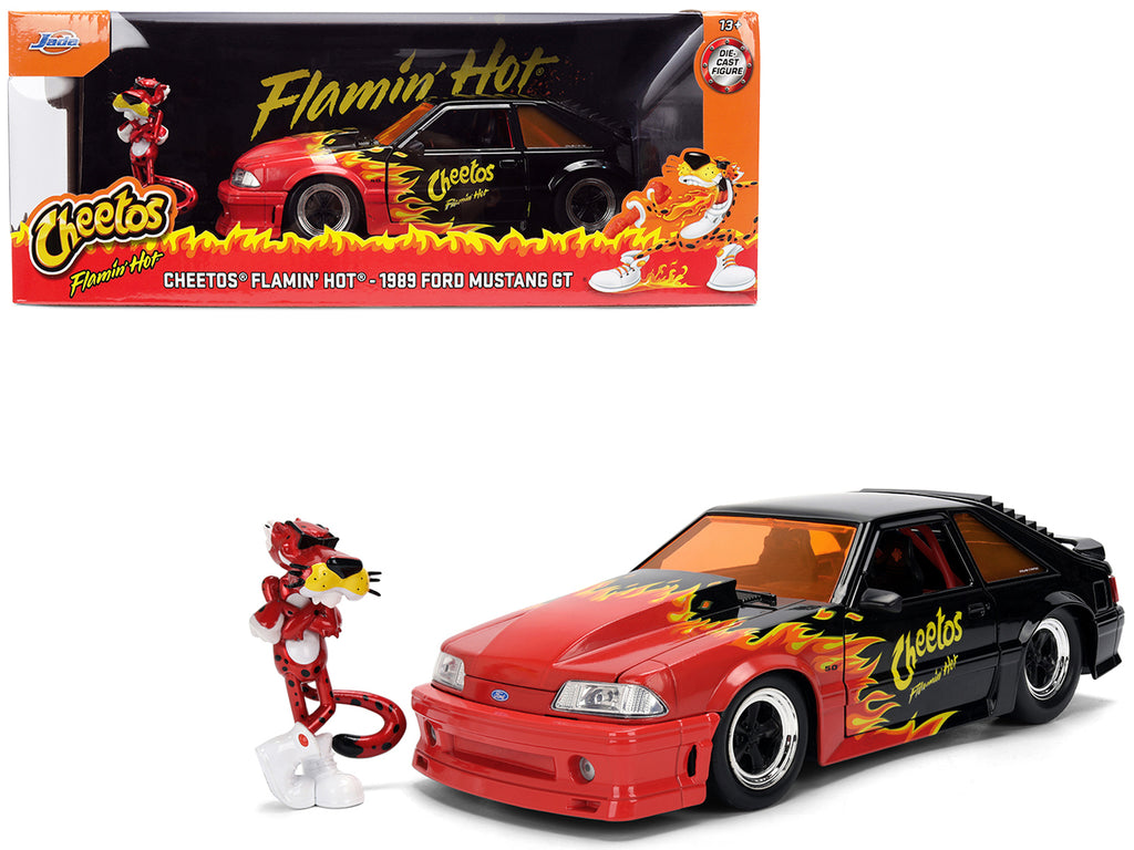 1989 Ford Mustang GT Black with Red Flame Graphics and Chester Cheetah Diecast Figure 'Cheetos Flamin' Hot' 'Hollywood Rides' Series 1/24 Diecast Model Car by Jada