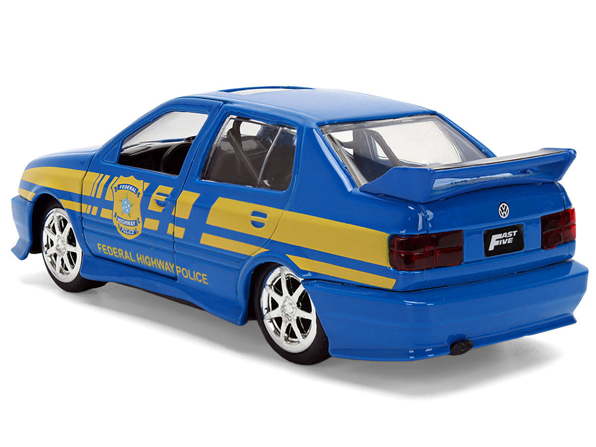 Volkswagen Jetta Police Vehicle 'Rio Federal Highway Police' Blue with Yellow Stripes 'Fast Five' (2011) Movie 'Fast & Furious' Series 1/32 Diecast Model Car by Jada