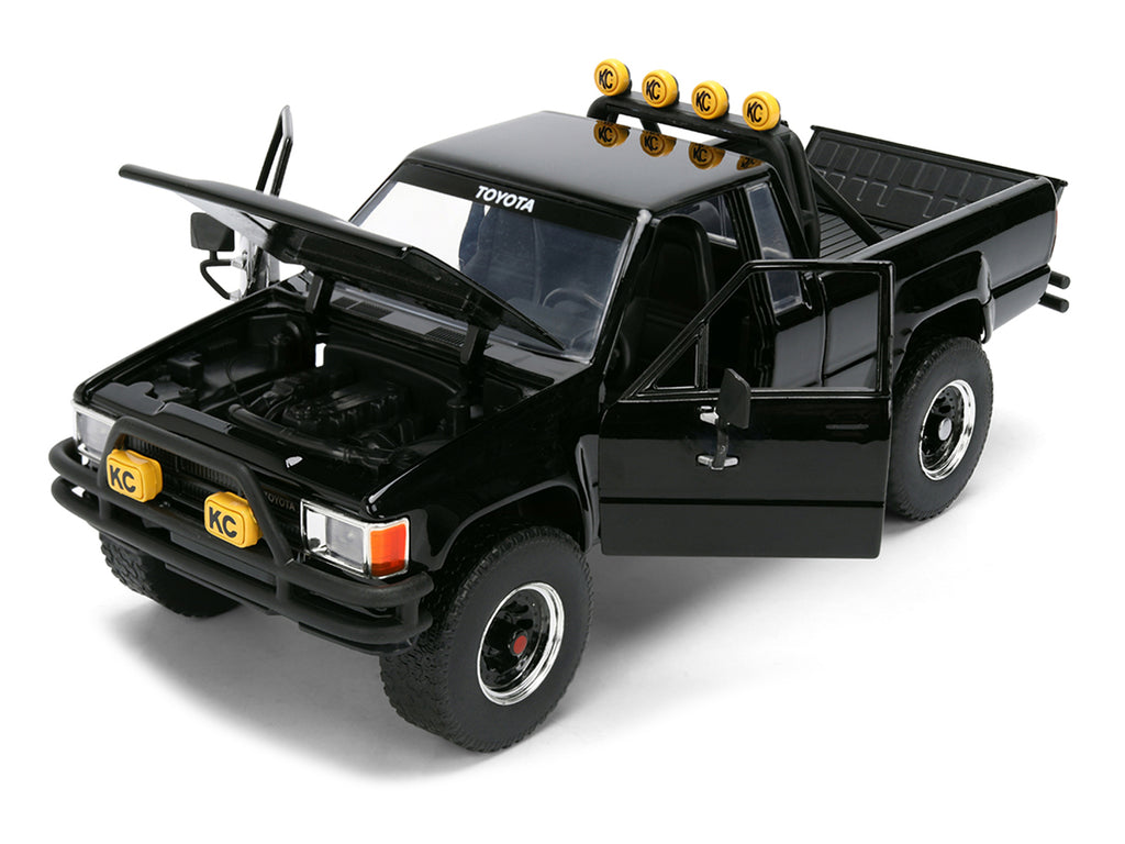 1985 Toyota SR5 Pickup Truck Black with Marty's Skateboard 'Back to the Future' (1985) Movie 'Hollywood Rides' Series 1/24 Diecast Model Car by Jada