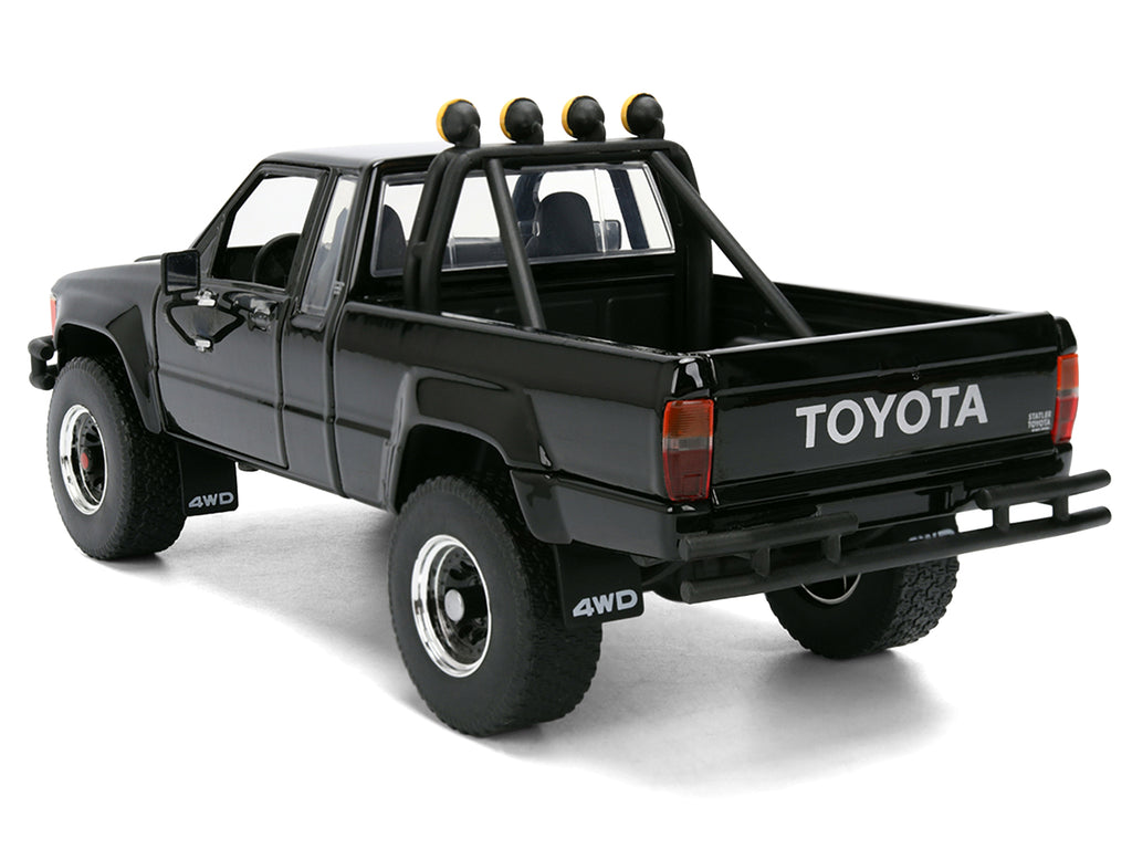 1985 Toyota SR5 Pickup Truck Black with Marty's Skateboard 'Back to the Future' (1985) Movie 'Hollywood Rides' Series 1/24 Diecast Model Car by Jada