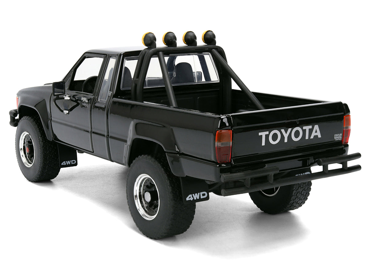 1985 Toyota SR5 Pickup Truck Black with Marty's Skateboard 'Back to the Future' (1985) Movie 'Hollywood Rides' Series 1/24 Diecast Model Car by Jada