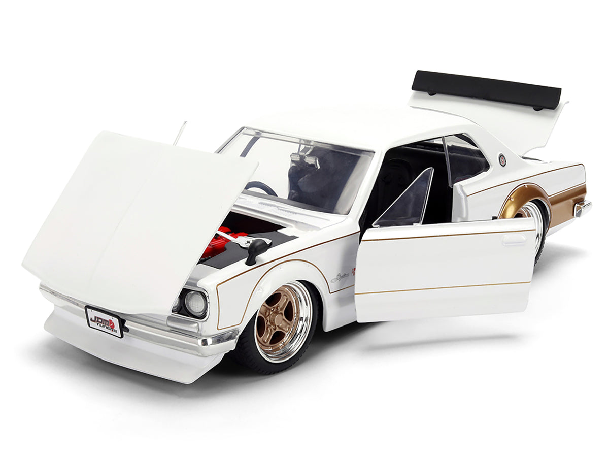 1971 Nissan Skyline 2000GT-R RHD (Right Hand Drive) White with Gold Graphics 'JDM Tuners' Series 1/24 Diecast Model Car by Jada