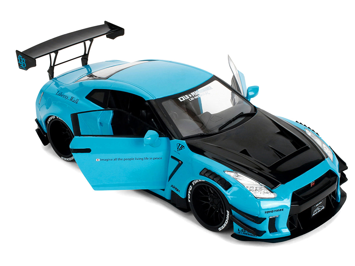 Nissan GT-R (R35) Liberty Walk Body Kit 2.0 RHD (Right Hand Drive) Blue with Black Hood 'Pink Slips' Series 1/18 Diecast Model Car by Jada