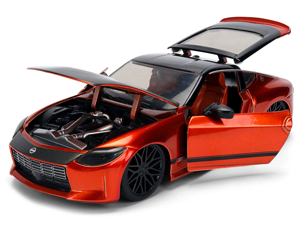 2023 Nissan Z Orange Metallic with Carbon Hood and Black Top 'JDM Tuners' Series 1/24 Diecast Model Car by Jada