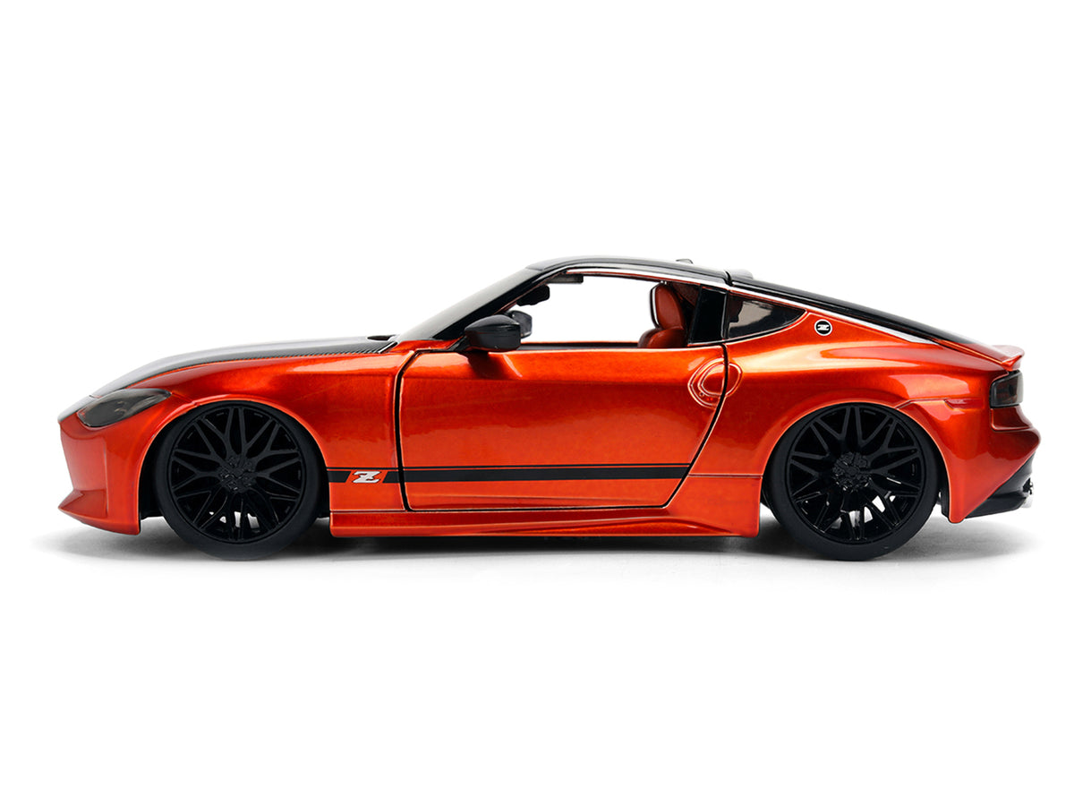 2023 Nissan Z Orange Metallic with Carbon Hood and Black Top 'JDM Tuners' Series 1/24 Diecast Model Car by Jada